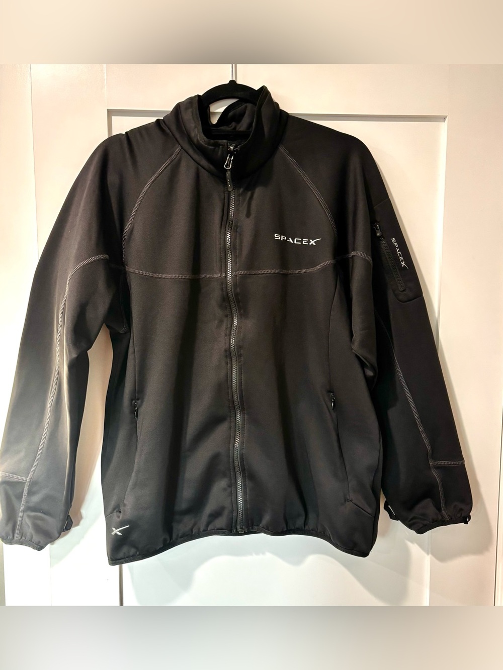 Space X Official Black Jacket, zippered pockets.